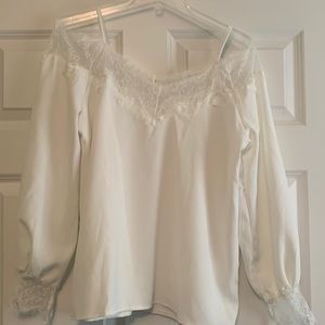 Silky ivory blouse.